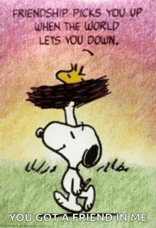 snoopy is holding a piece of wood on his head with a quote .