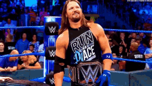 a wrestler is wearing a shirt that says run the damn ace
