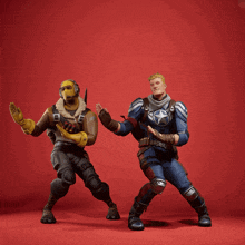 a man in a captain america costume stands next to another man