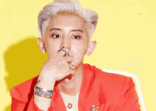 a close up of a man 's face with a yellow background and a watermark that says ctrl