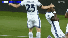 a soccer player with the number 23 on his shirt