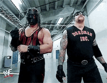 Undertaker Kane GIF - Undertaker Kane Evil GIFs