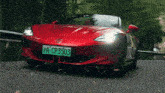 a red sports car with pa cp3503 on the front license plate