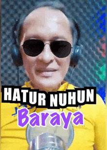 a man wearing sunglasses and headphones with the words " hatur nuhun baraya " on the bottom