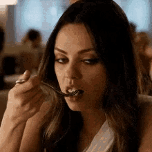 Mila Kunis Eating GIF - Mila Kunis Eating Wait What GIFs
