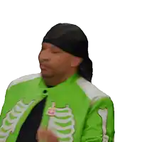 a man wearing a green skeleton jacket and a black bandana