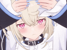 a close up of a girl 's face with a collar around her neck