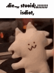 a stuffed animal with a face on it is being used as a meme .