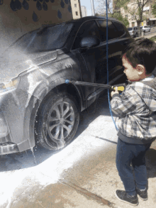 Wow Child GIF - Wow Child Cleaning Car GIFs