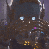 a girl with blue eyes and a crown on her head is wearing a robot costume .