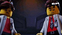 a man and a woman are standing next to each other with the word ok on the bottom right