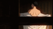 a man with white hair is behind a wooden door