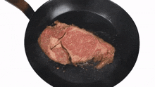 cooking steak internet shaquille flipping meat over bourbon marinade ribeye steak