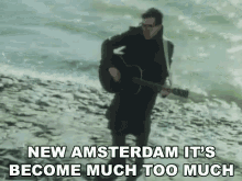New Amsterdam Its Become Much Too Much Strumming GIF - New Amsterdam Its Become Much Too Much Much Too Much Strumming GIFs