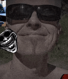 a man wearing sunglasses is smiling with a troll face behind him