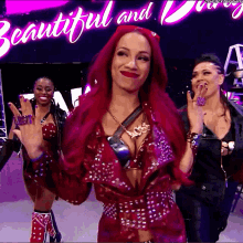 a woman with red hair is standing in front of a sign that says beautiful and dirty