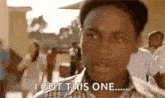 a young man is standing in front of a crowd of people and says `` i got this one ... '' .