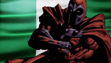 a man in a red cape is standing in front of a green background