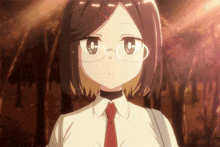 a girl wearing glasses and a red tie