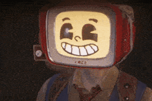 a man with a tv on his head with a smiley face on it