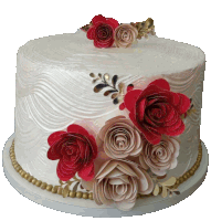 a white cake with red and beige roses on top