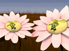 two pink flowers with frogs on the centers of them