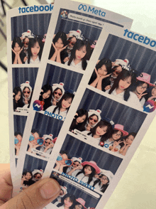 a person holding a stack of facebook photo booth pictures