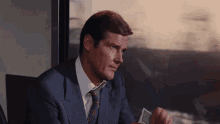 Live And Let Die Roger Moore GIF - Live And Let Die Roger Moore James Bond GIFs