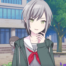 a girl with gray hair and green eyes is wearing a green jacket