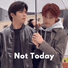 two young men standing next to each other under an umbrella with the words " not today " above them