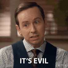 a man in a suit and tie says it 's evil in a netflix ad