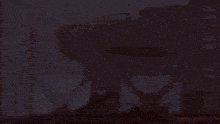 a blurred image of a fire coming out of a sign