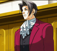 a man in a red suit and white tie
