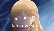 a cartoon of a girl with the words kibii evil smile written above her