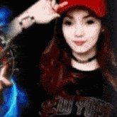 a blurry picture of a woman wearing a red hat and a new york shirt