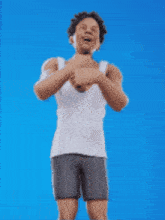 a man in a white tank top and shorts is covering his mouth