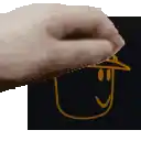 a hand is drawing a smiley face with a hat