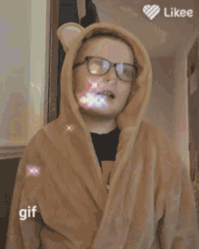 a girl wearing glasses and a bear costume with a likee logo