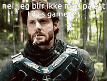 a man smoking a cigarette with the words nei jeg blir ikke med på ett til cs game ( 2 )