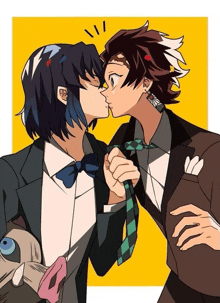 a man in a suit and tie kisses another man