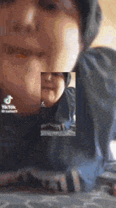 a close up of a person 's face with tiktok written on the bottom right