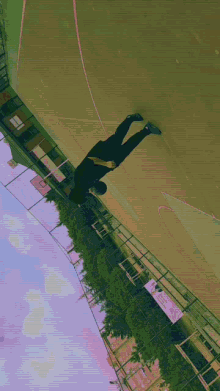 a person is doing a handstand on a basketball court with a sign that says ' basketball court ' on it