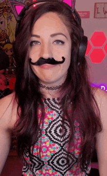 a woman wearing headphones and a fake mustache has a choker around her neck
