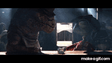 a cartoon character with flames coming out of its mouth is sitting at a bar