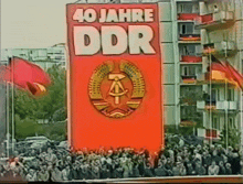 a large red sign says 40 jahre ddr