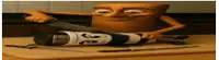 a cartoon character is cutting something with a knife on a cutting board ..