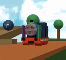 a cartoon train with a face on the side of it
