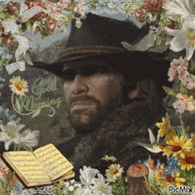 a man in a cowboy hat is surrounded by flowers and a book that says good morning