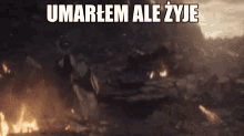 a black and white image with the words umarem ale zyje on it