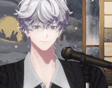 a man with a microphone in front of him
